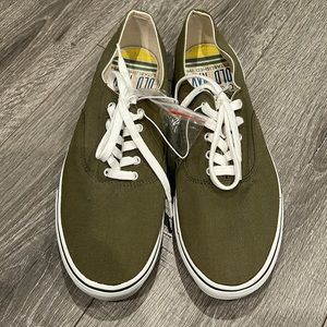 Brand new moss green laced sneakers.